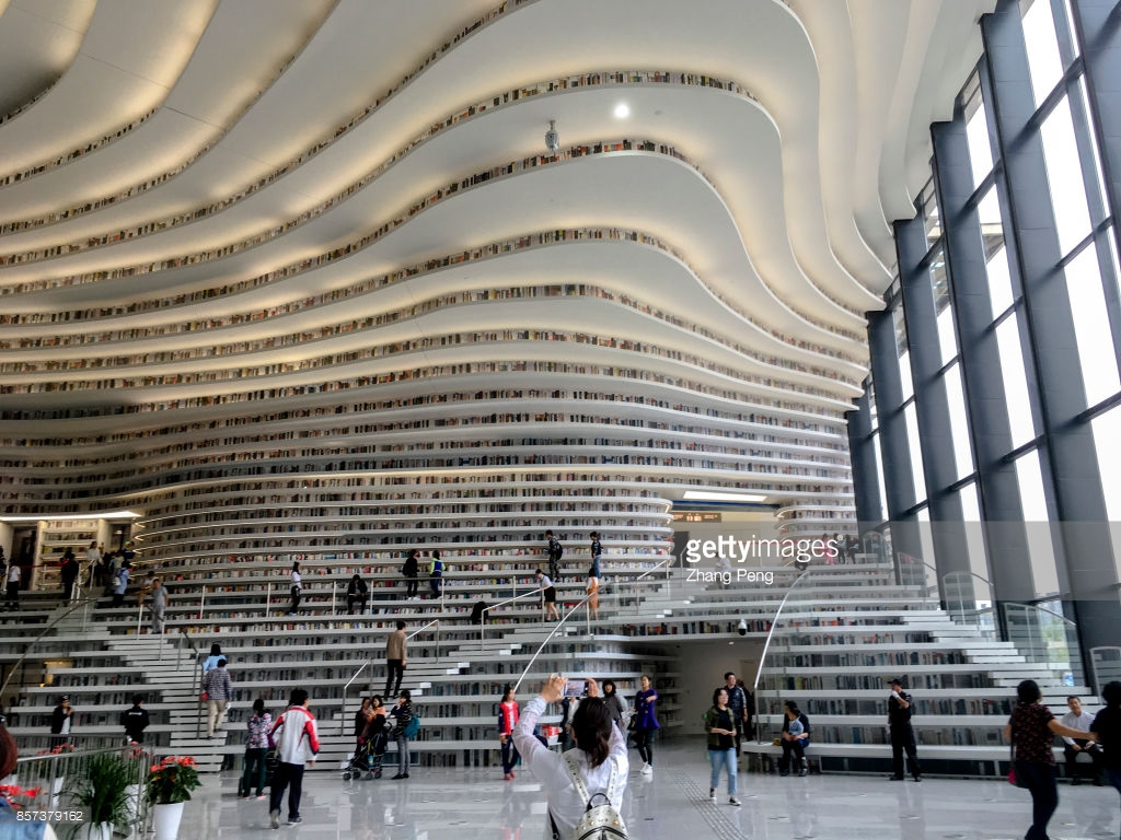 TIANJIN, CHINA - 2017/10/02: The Binhai new area library, opened in the National day, also called "the eye of Binhai", located in the cultural center of Binhai new area,  is a new cultural landmark and travel destination. (Photo by Zhang Peng/LightRocket via Getty Images)